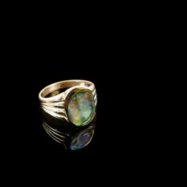 Silver ring with large oval natural paua piece