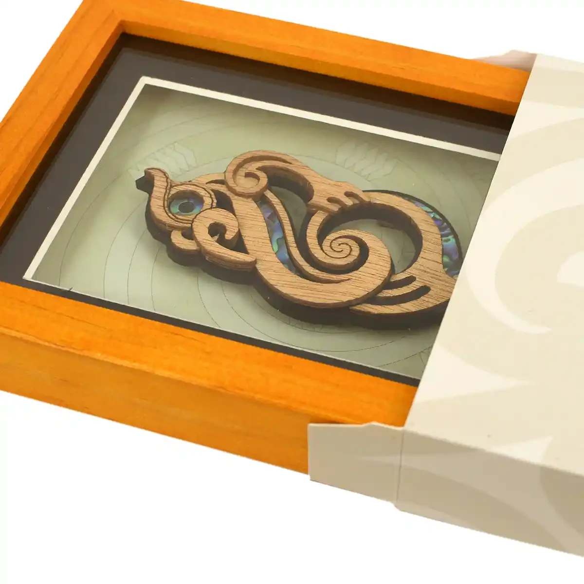 Contemporary Māori art. Framed Māori manaia carving, medium