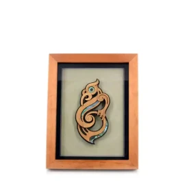 Contemporary Māori art. Framed Māori manaia carving, small.
