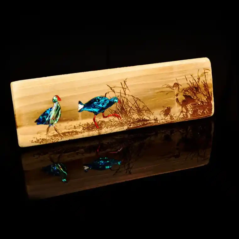 Recycled wood with pūkeko