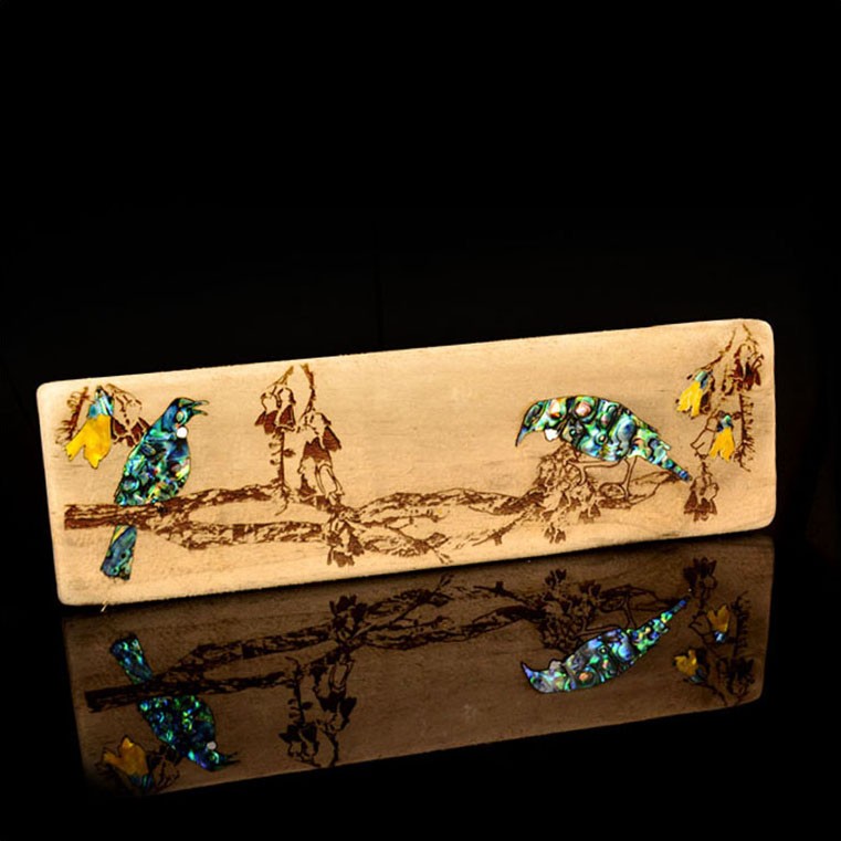 Recycled wood with tūī and kōwhai