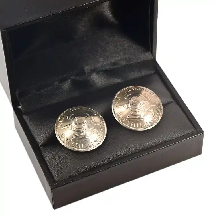 Cufflinks: one shilling coins