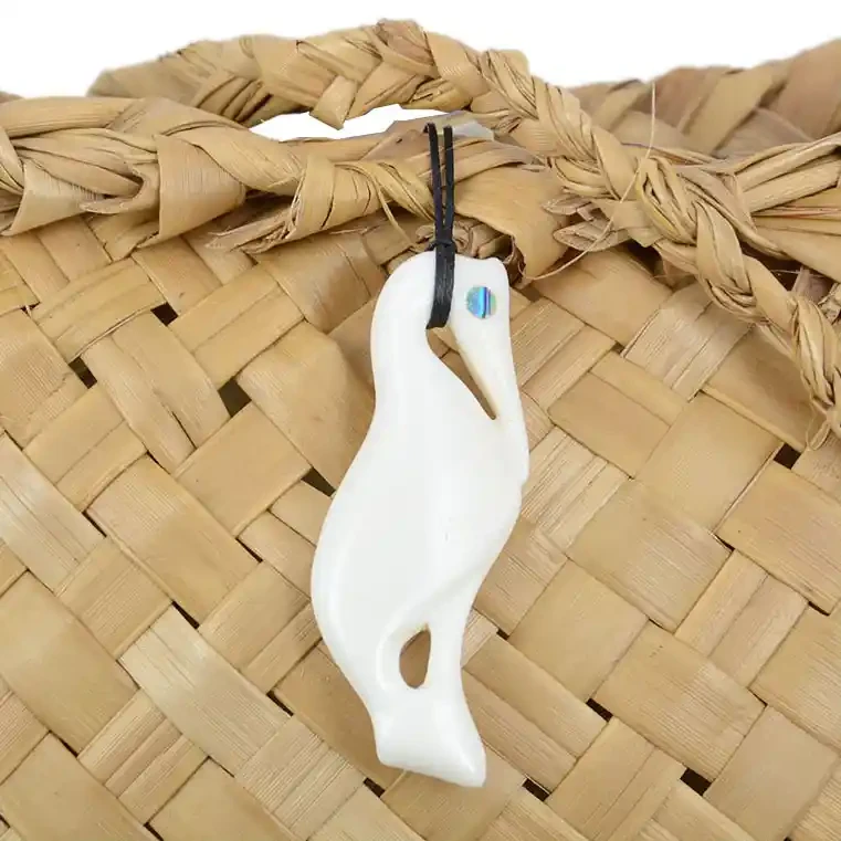 White heron bone carving. Kotuku.