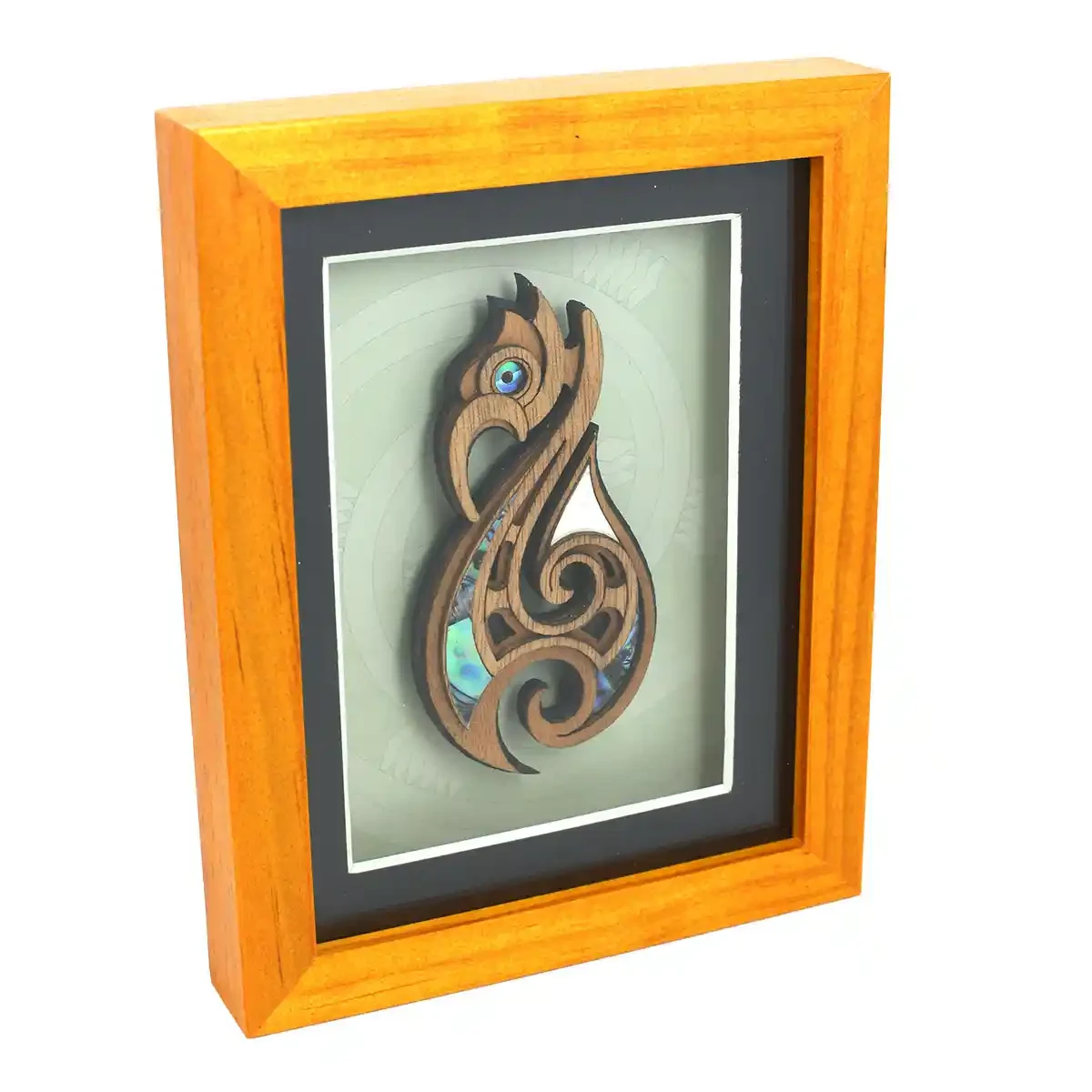 Medium framed Māori fishhook carving
