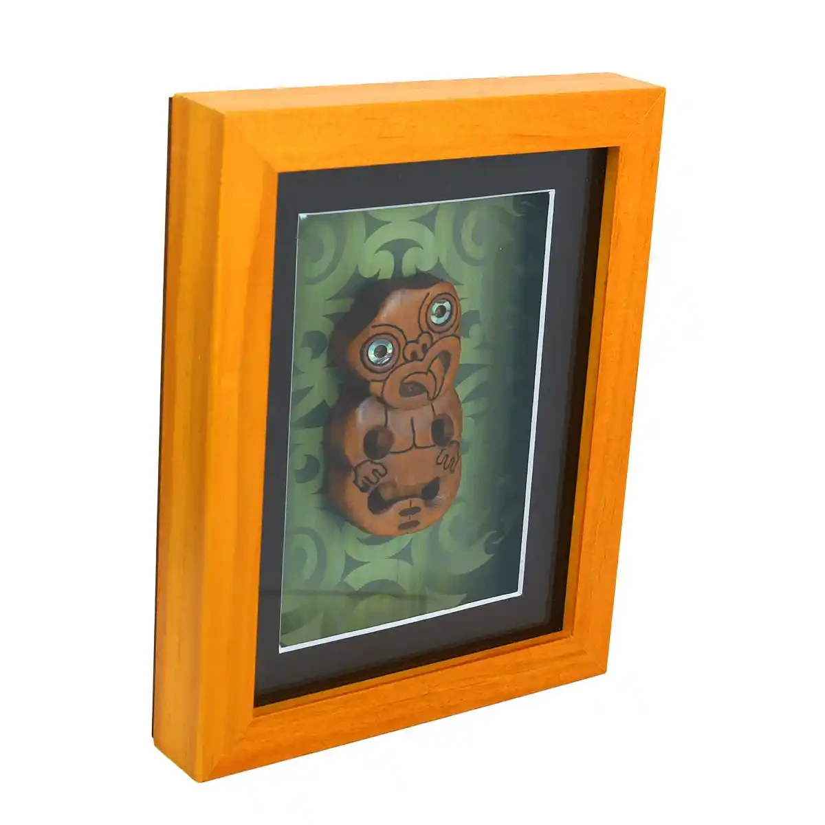 Contemporary Māori art. Framed Māori tiki, kauri. Small.