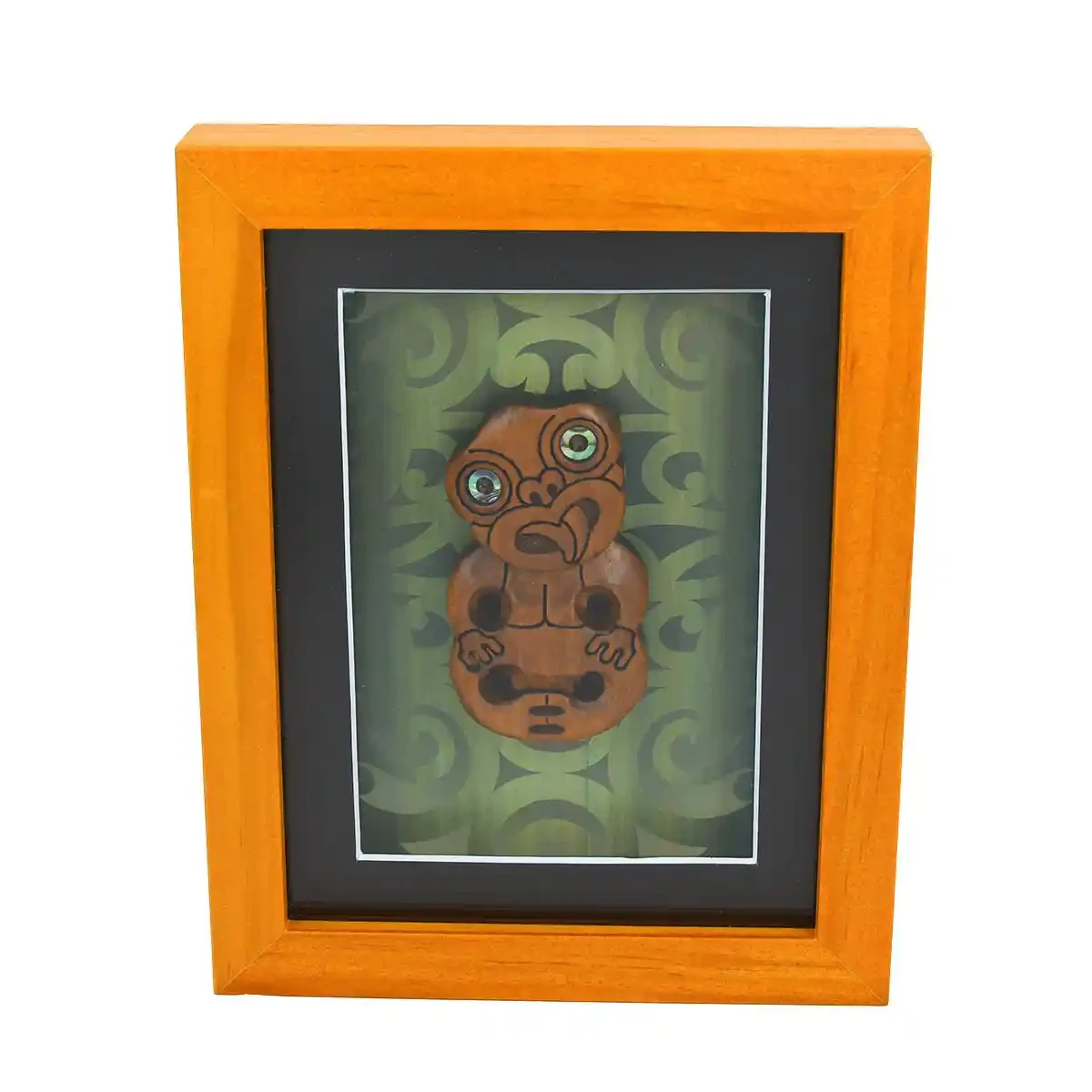 Contemporary Māori art. Framed Māori tiki, kauri. Small.