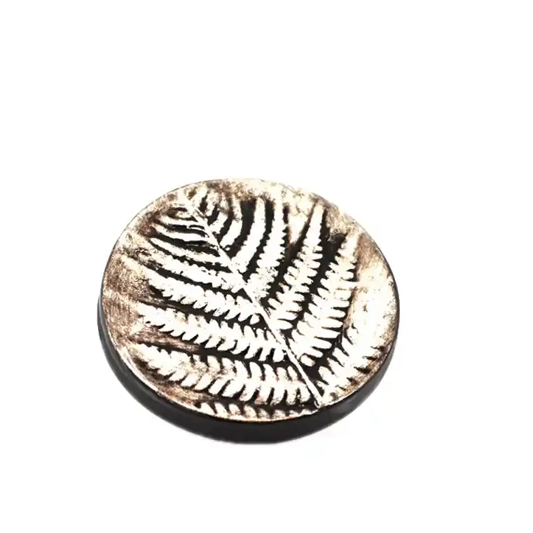 Round ceramic fern decoration
