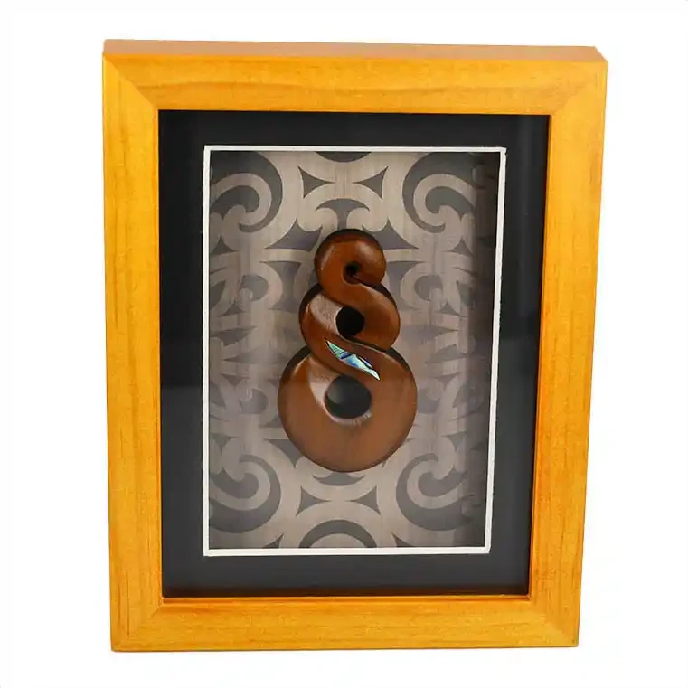 Framed Māori twist carving