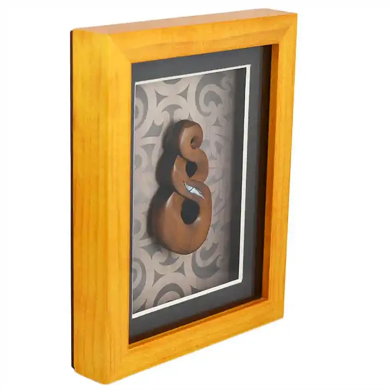 Framed Māori twist carving