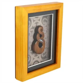 Framed Māori twist carving