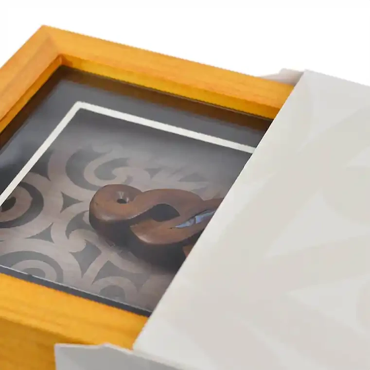 Framed Māori twist carving