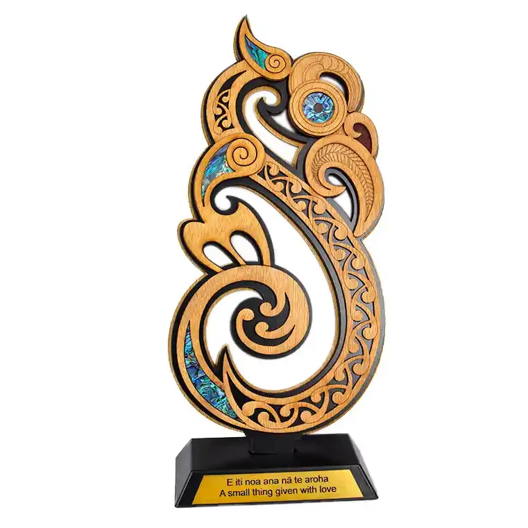 Large manaia trophy with engraving