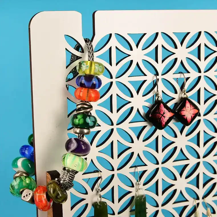 Jewellery stand with frangipani design