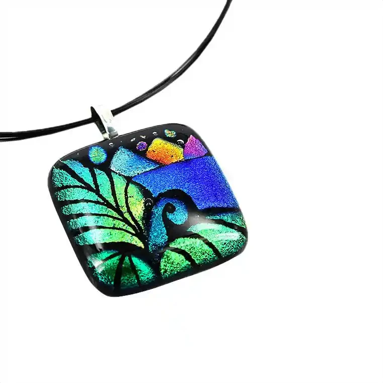 Green koru glass pendant