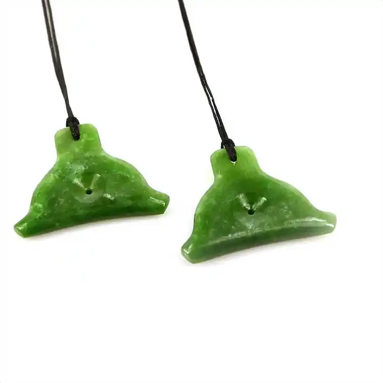 Greenstone dog whistle pendant