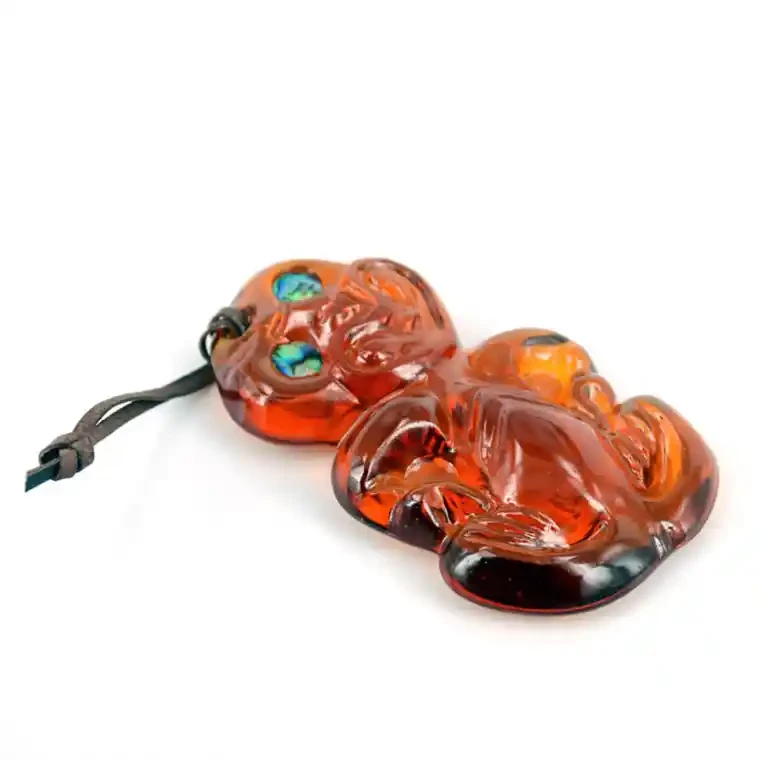 Glass tiki. Glass Māori tiki, shiny finish