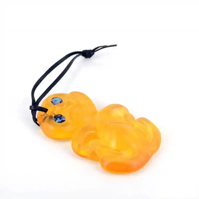 Glass tiki. Glass Māori tiki, shiny finish