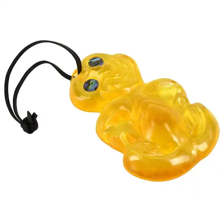 Glass tiki. Glass Māori tiki, shiny finish