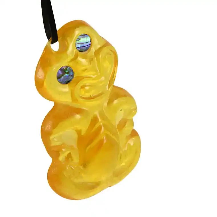 Glass tiki. Glass Māori tiki, shiny finish