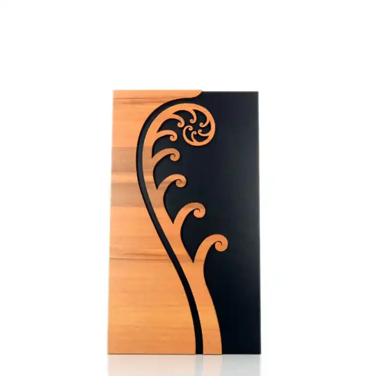 Koru wall hanger from rimu veneer