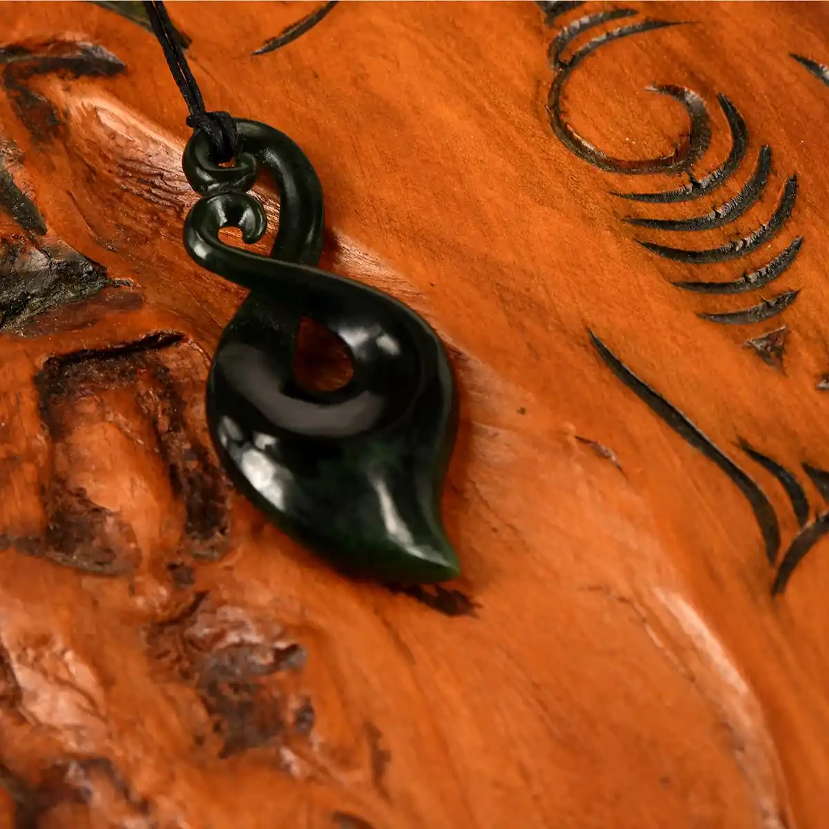 Twist with double koru greenstone pendant