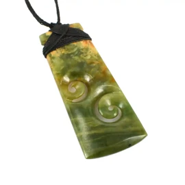 Adze with double koru