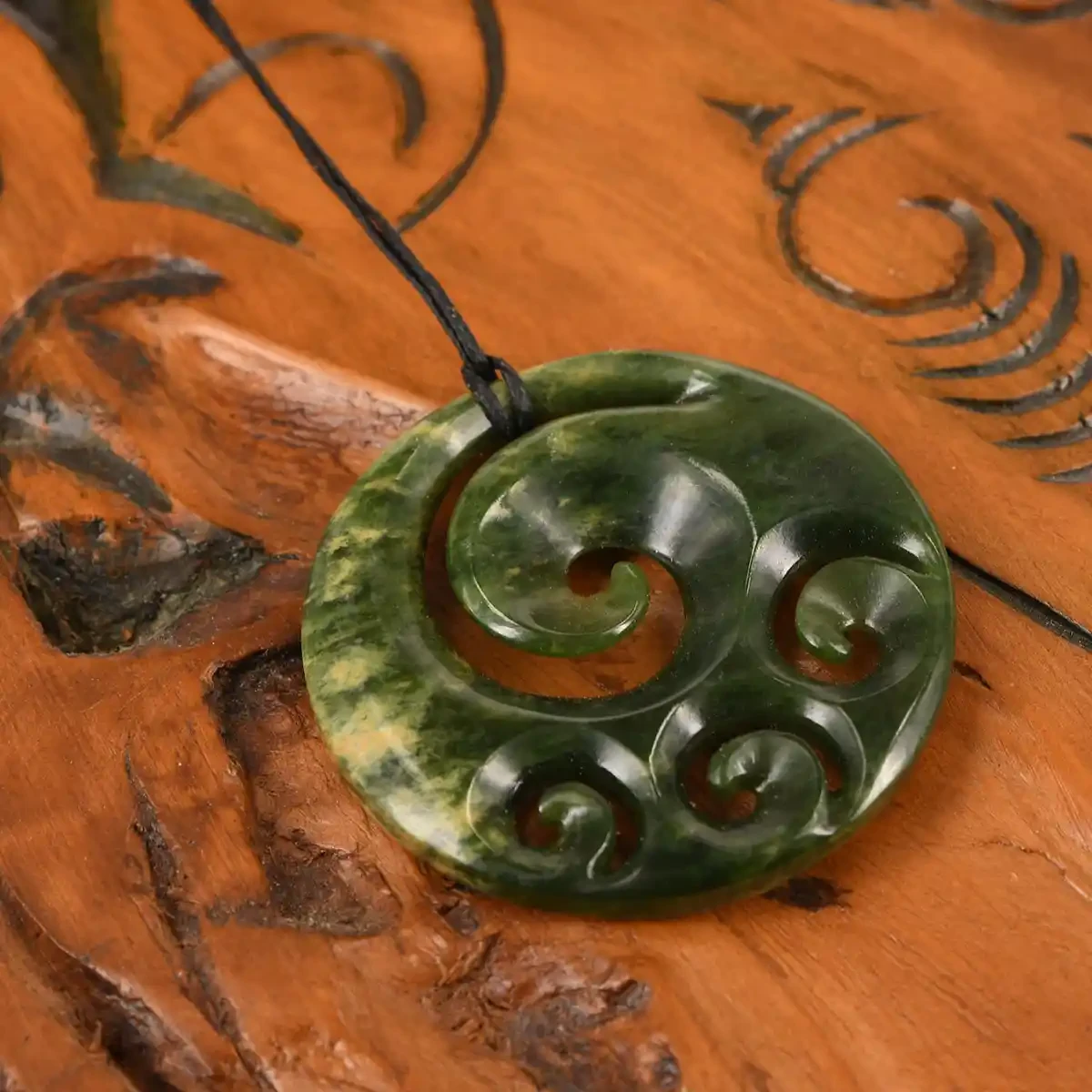 Koru greenstone pendant