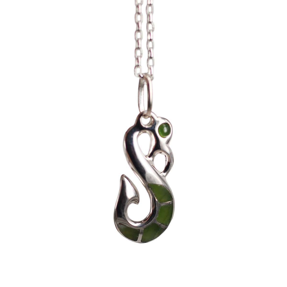 Sterling silver manaia pendant with pounamu