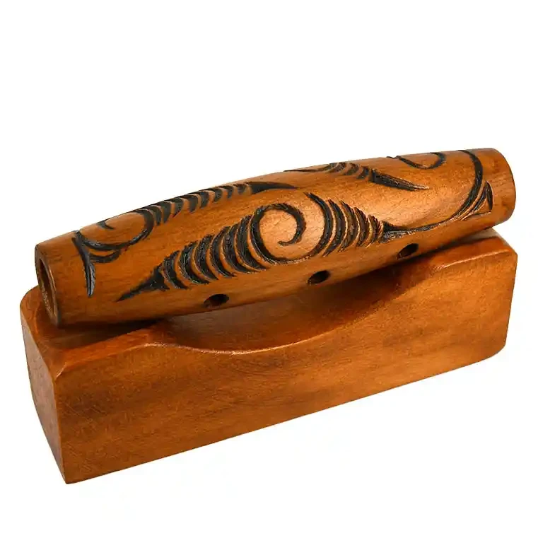 Māori koauau with wooden stand