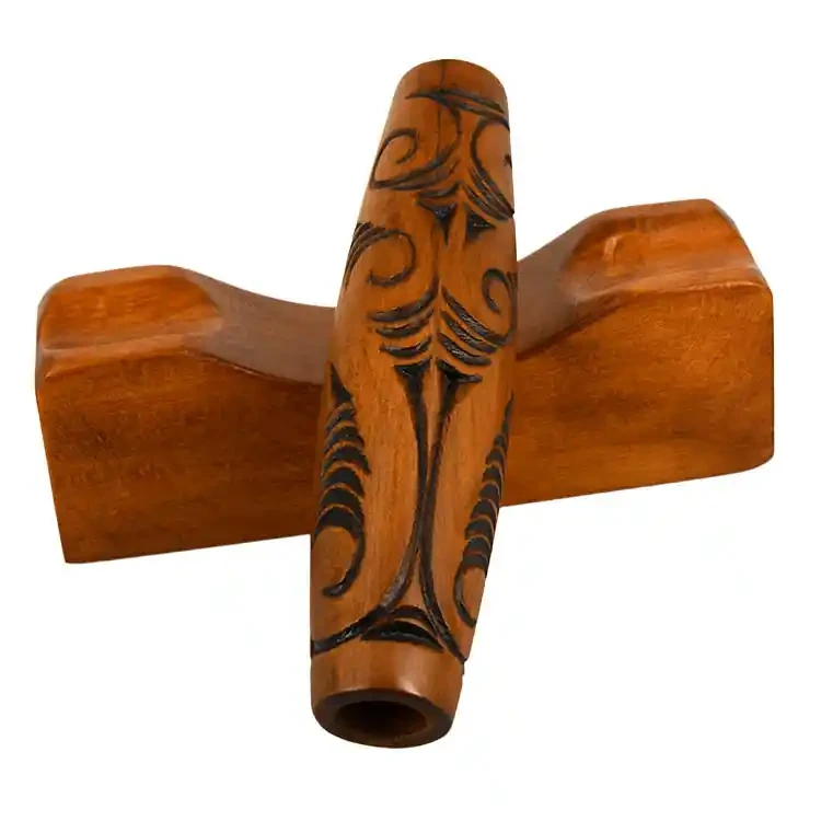 Māori koauau with wooden stand