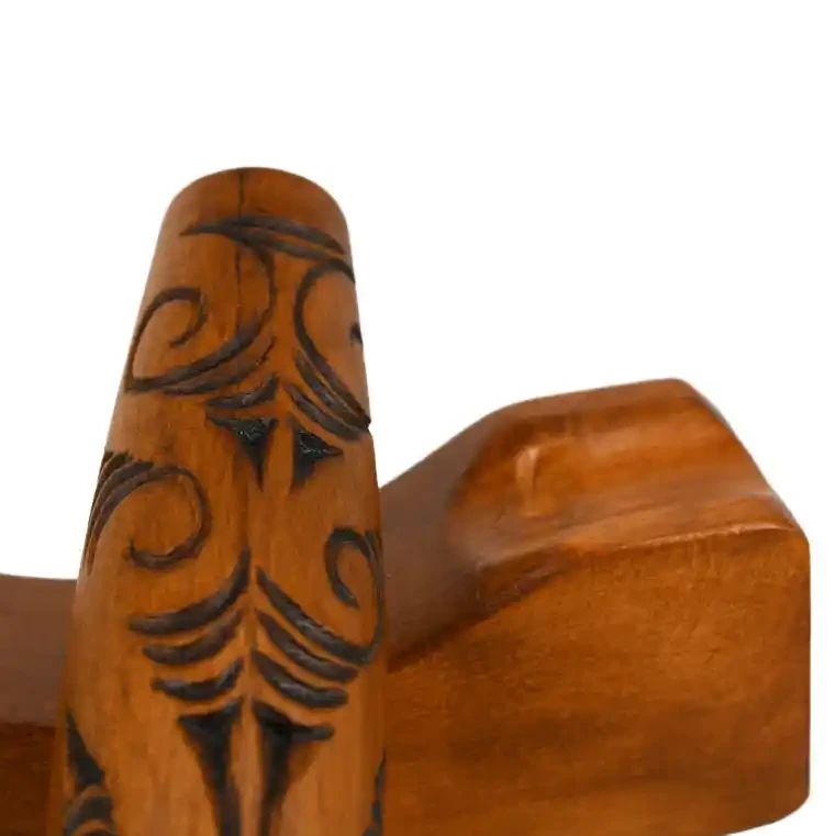 Māori koauau with wooden stand