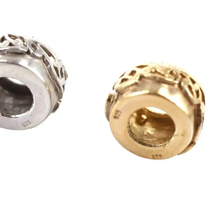 Sterling silver beads with kōwhaiwhai