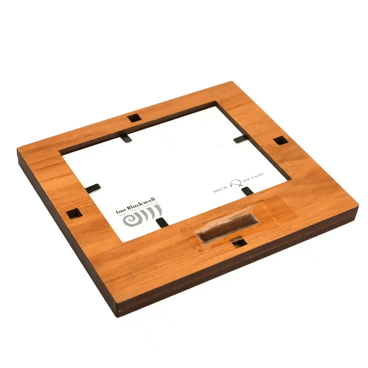 Rimu photo frame with paua laminate