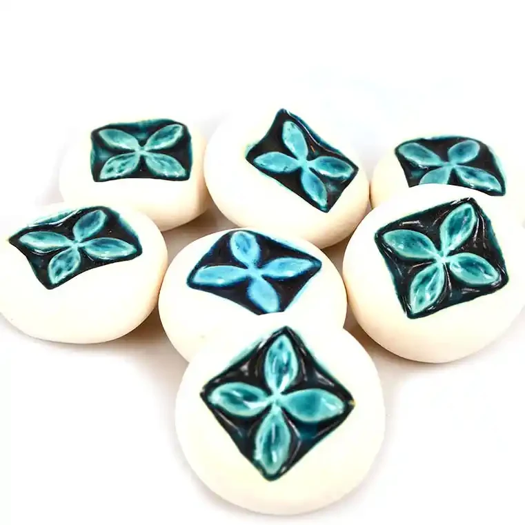 Ceramic pebbles, tapa