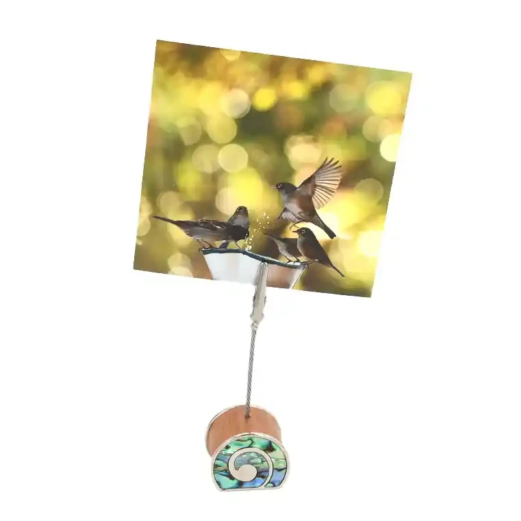 Koru photo holders with paua inlay