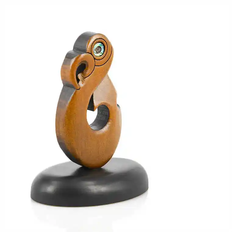 Small Maori fishhook on a stand
