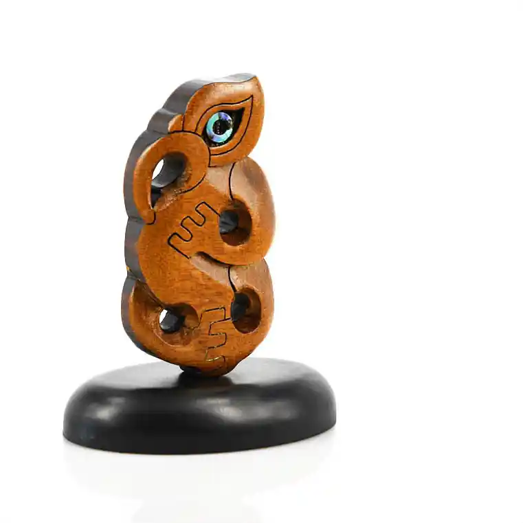 Manaia carving on a stand. A manaia is a guardian